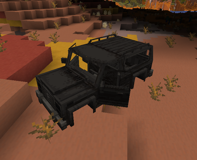 A blown-up SUV in the wasteland